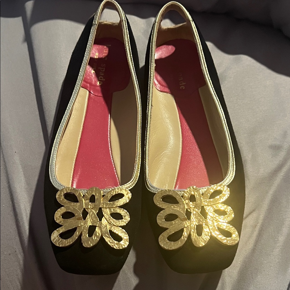 Kate Spade Elegant Black Flats with Gold Detailing